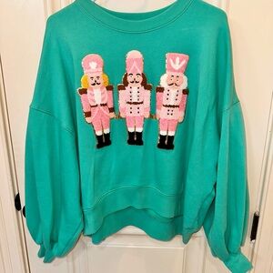 Judith March Teal Sweater with Pink Nutcracker Design